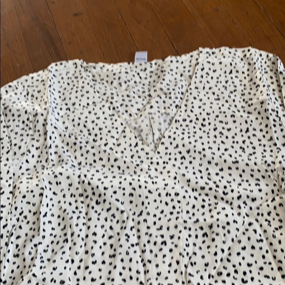 Long sleeved V-neck tunic top. NWT.